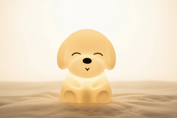 Puppy LED Night Light – warm white silicone puppy lamp glowing softly in a dark room