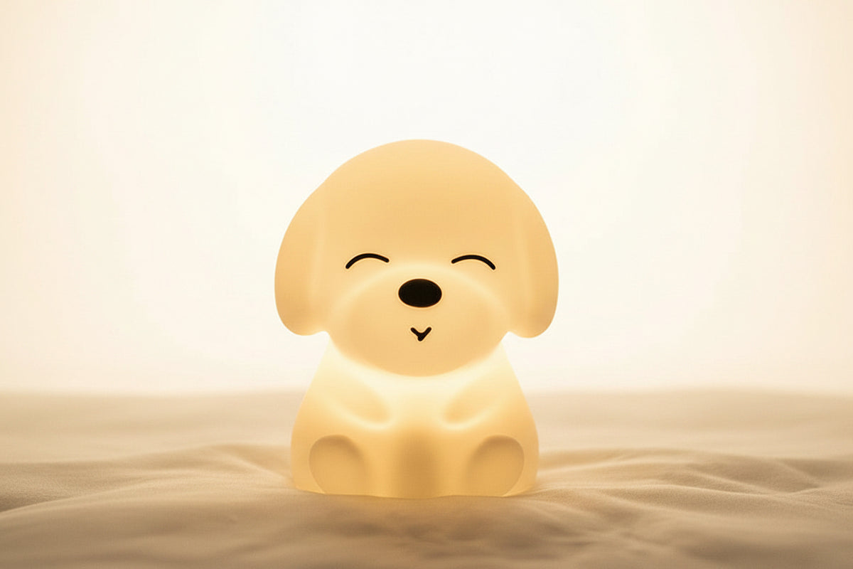 Puppy LED Night Light – warm white silicone puppy lamp glowing softly in a dark room
