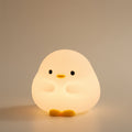 Duck LED Silicone Night Light - warm glowing silicone duck lamp with crescent moon motif | Lumafye