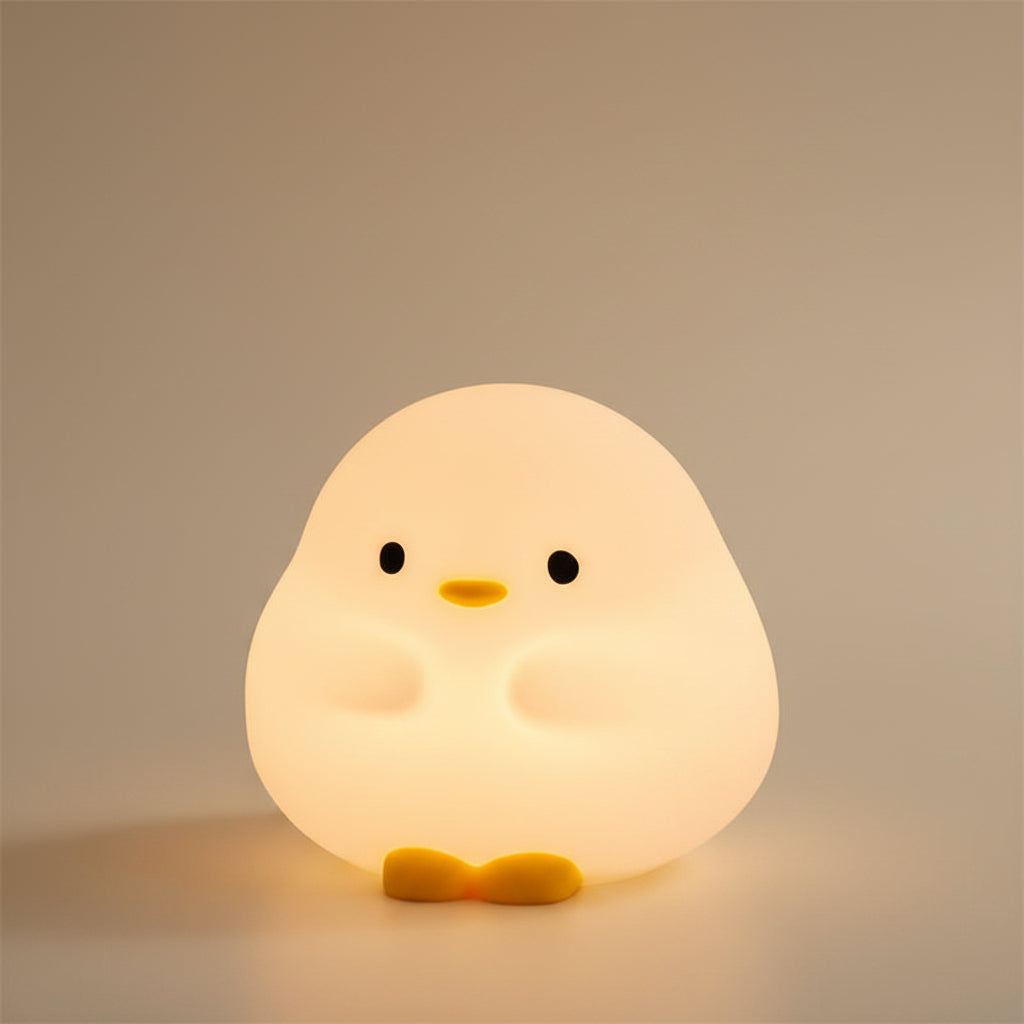 Duck LED Silicone Night Light - warm glowing silicone duck lamp with crescent moon motif | Lumafye