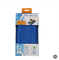 Lumafye Dog Cooling Mat shown in its retail packaging, Sapphire Blue, size M